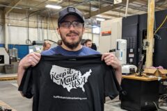 guy holding keep it made usa shirt