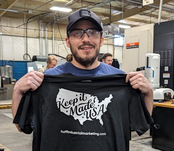 guy holding keep it made usa shirt